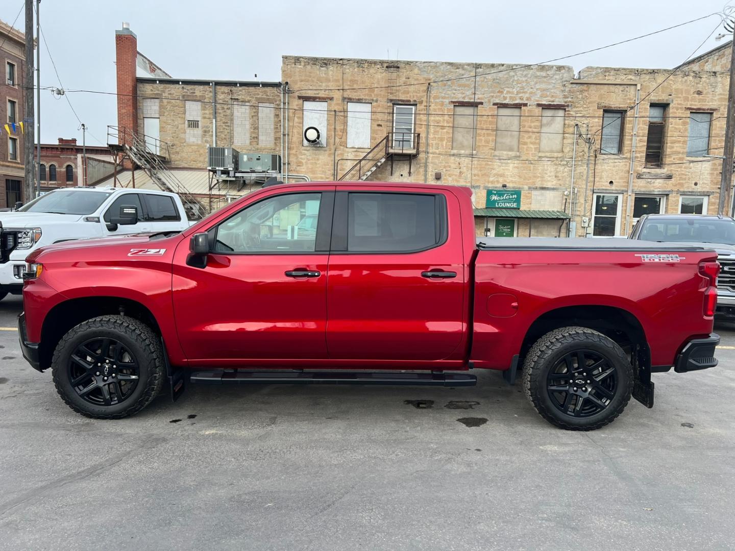 2021 Maroon /Charcoal Chevrolet Silverado 1500 Trail Boss (1GCPYFEL5MZ) with an 6.2L DI V8 engine, automatic transmission, located at 116 5th Avenue South, Lewistown, MT, 59457, 47.063877, -109.427879 - Explore the Rugged Elegance of Our Pre-Owned 2021 Chevrolet Silverado 1500 Crew Cab Trail Boss with a Mighty 6.2L Engine! Unleash the power of the open road with our exceptional 2021 Chevrolet Silverado 1500 Crew Cab Trail Boss. This pre-owned gem is equipped with a formidable 6.2L engine, delive - Photo#4